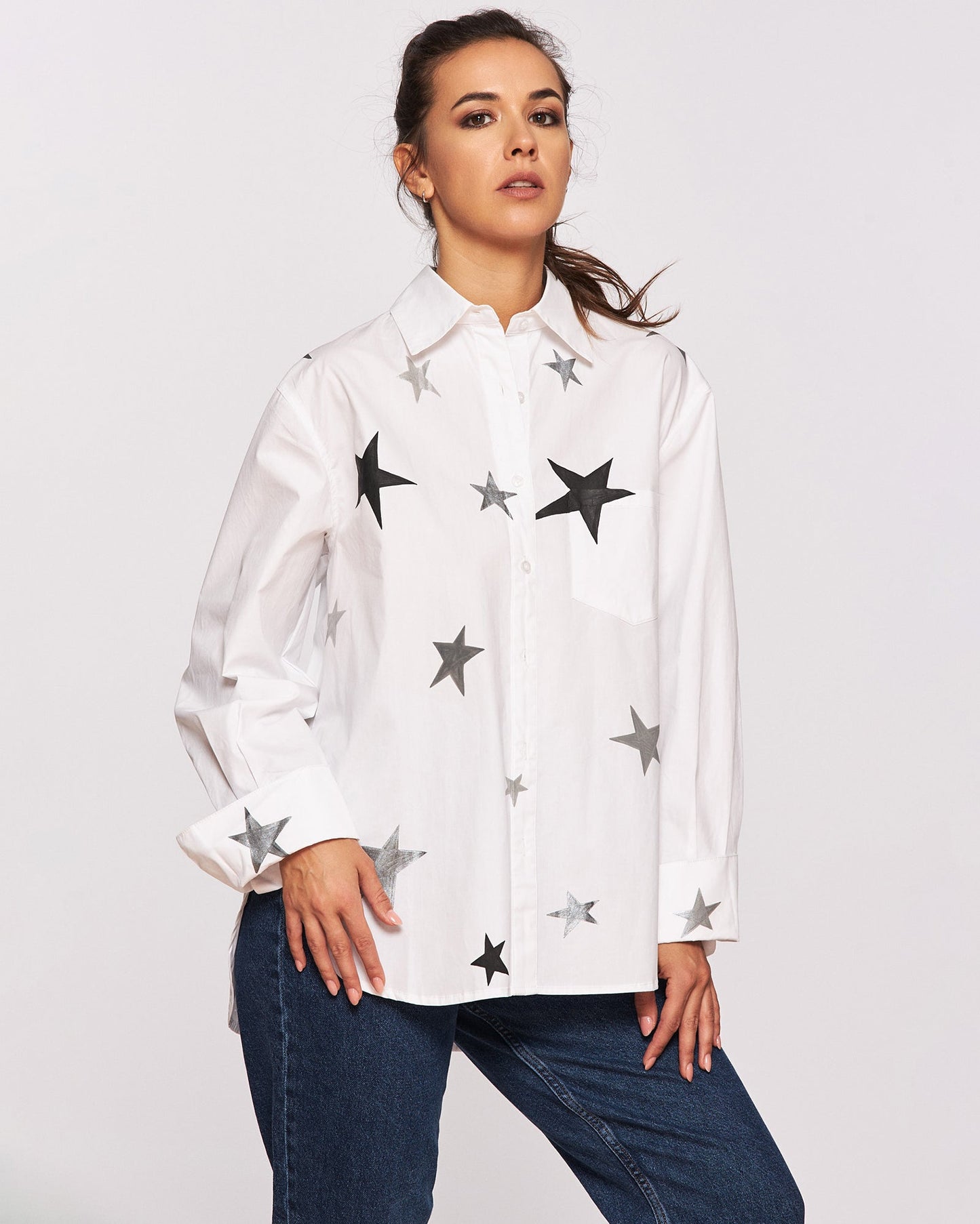 "It's written in the stars" hand painted shirt