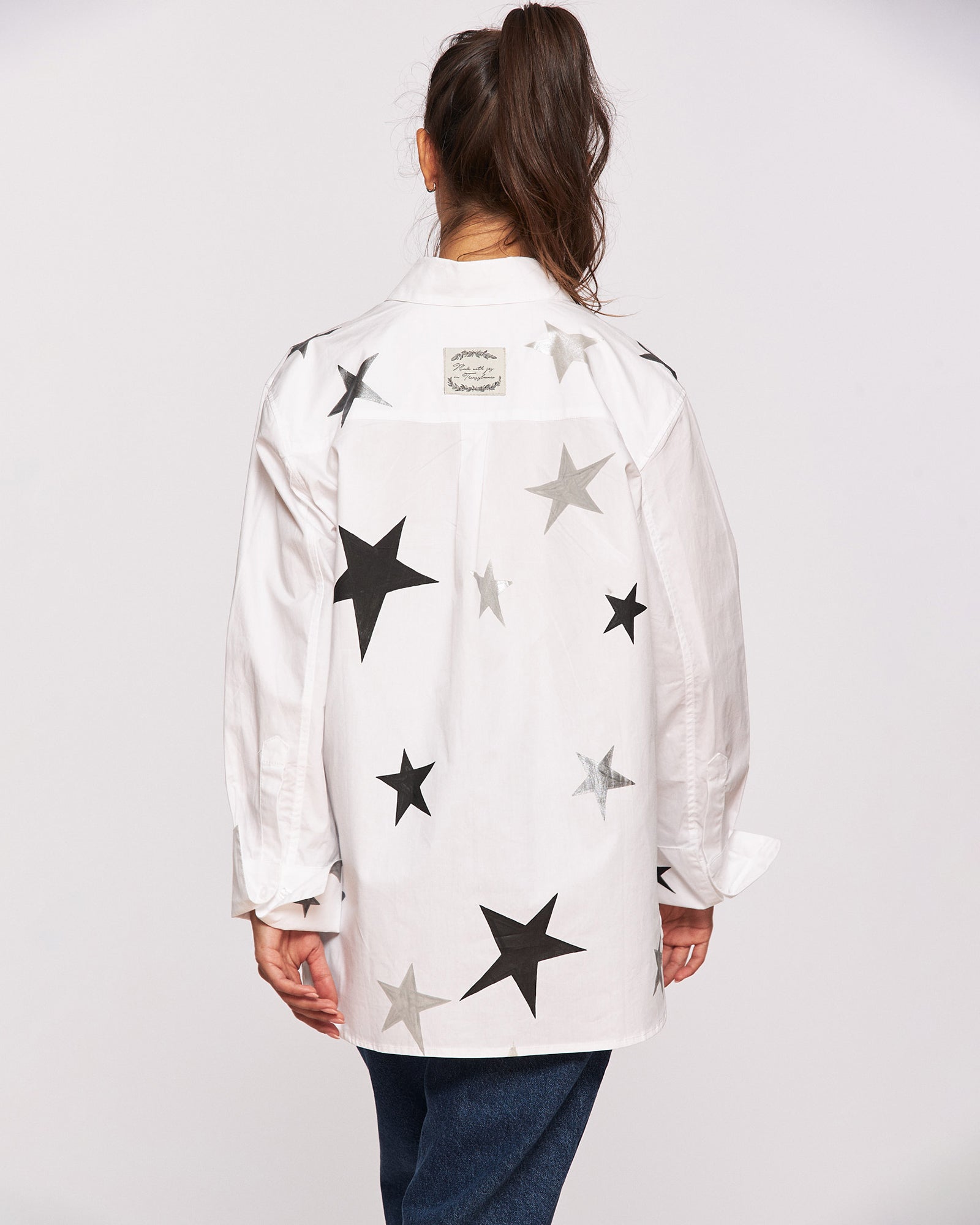 "It's written in the stars" hand painted shirt